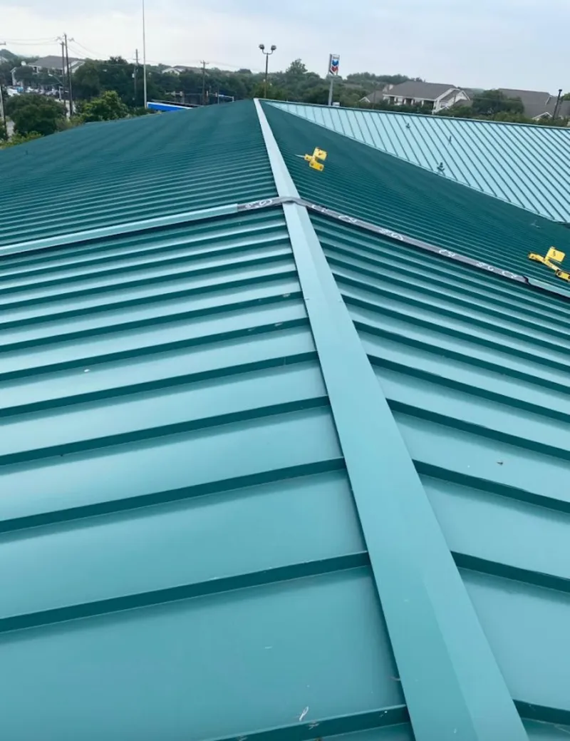 Green commercial metal roof ridge and valley for Metal Roof Repair in Fort Gratiot