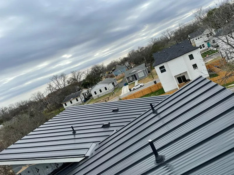 Standing seam metal roof panels with vents for Skylight Repair in Fort Gratiot
